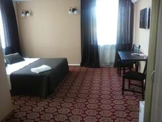 Отель Гостиница Троя Рудный Стандартный двухместный номер с 1 кроватью или 2 отдельными кроватями-1